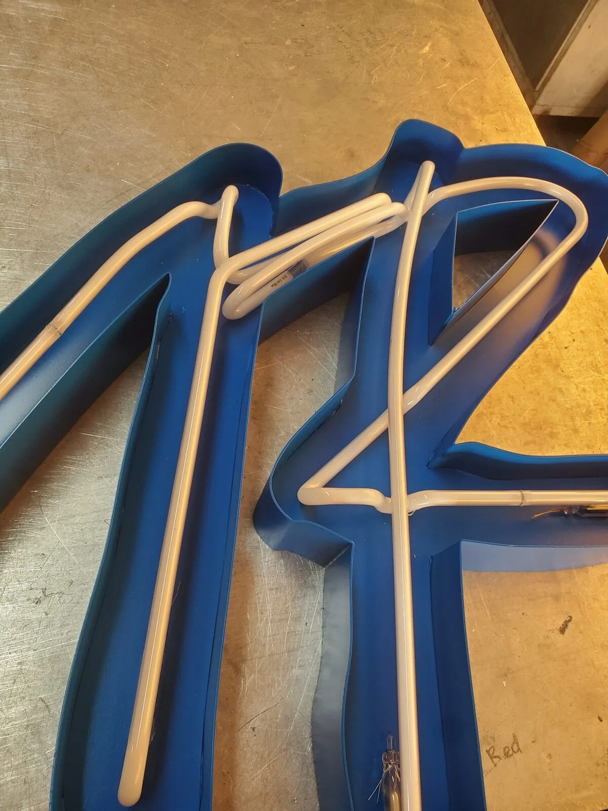 Rodeo Public Markets sign - installation detail