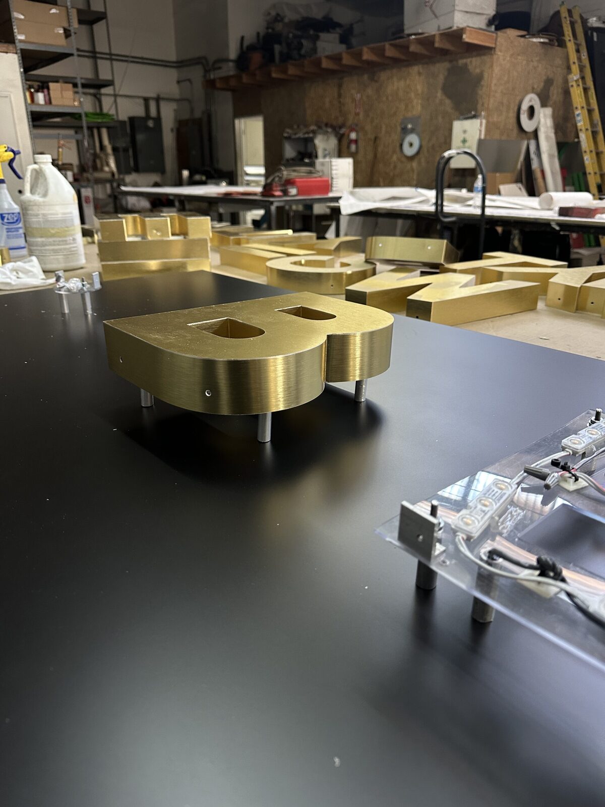 Custom glass neon installation hand-bent in the Gardena shop