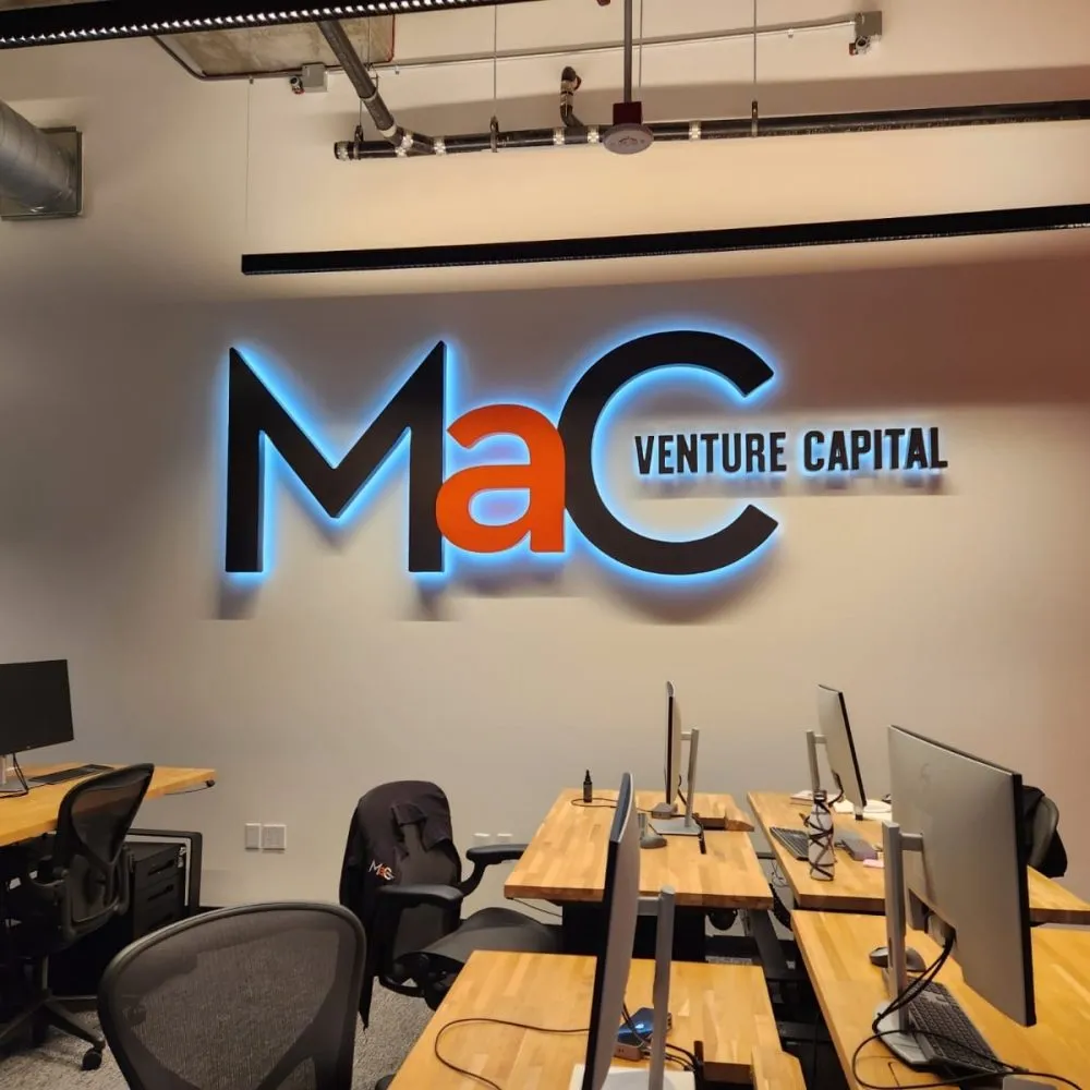 Halo-lit MaC Venture Capital channel letters installed on an office interior wall in Los Angeles
