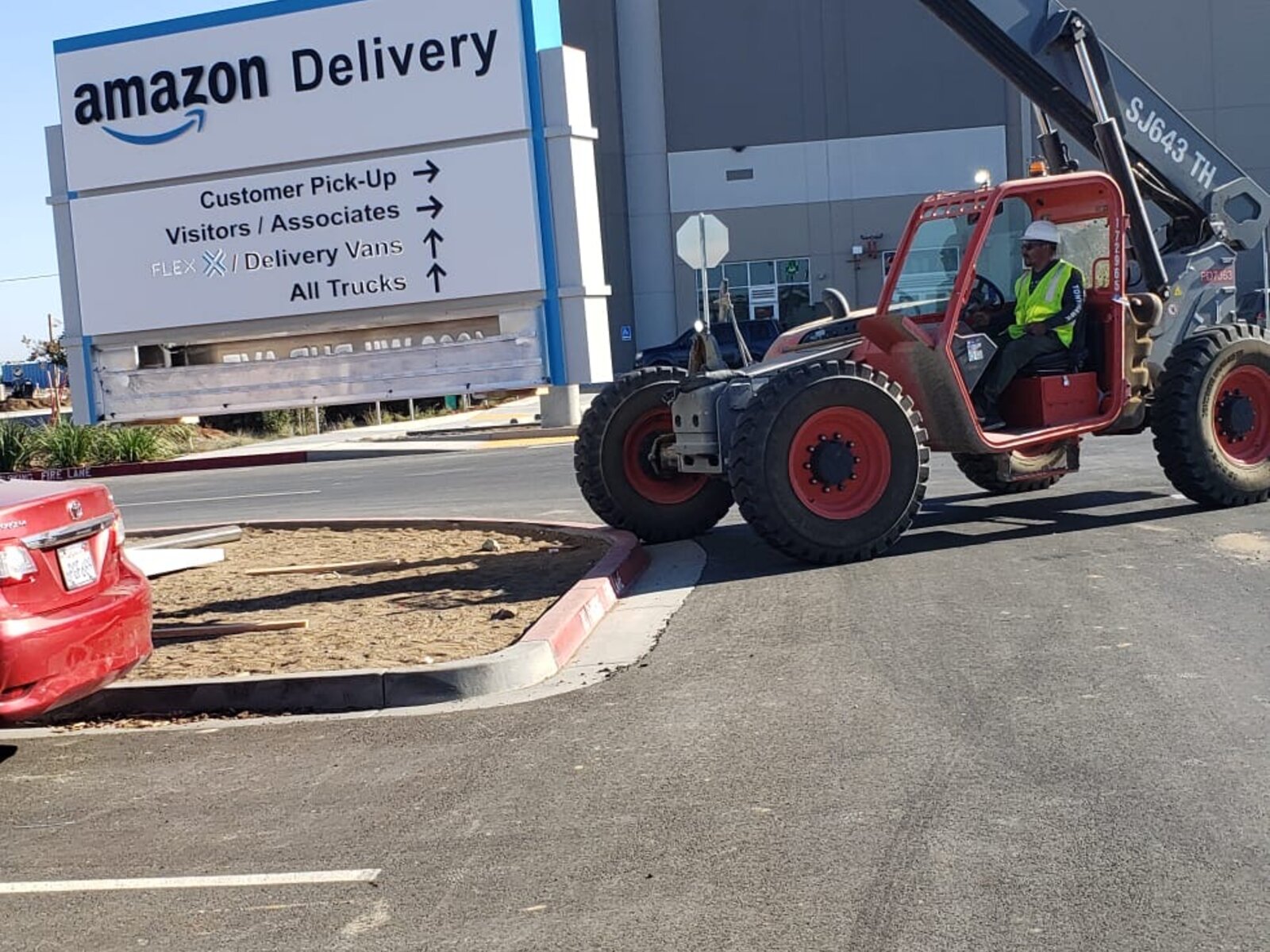 Amazon monument sign during installation at a Los Angeles commercial site